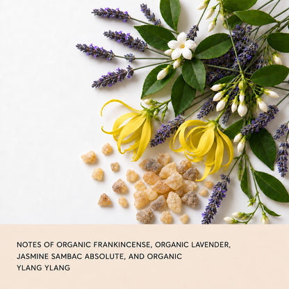 Flay lay of frankincense, ylang ylang, jasmine, and lavender florals with a description of the scent
