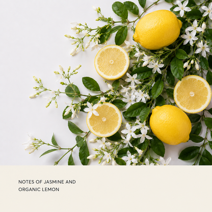 Organic lemons, including whole yellow lemons and sliced halves, arranged with green leaves and white jasmine flowers on a white background, with a cream-colored text banner at the bottom reading 'NOTES OF JASMINE AND ORGANIC LEMON'.