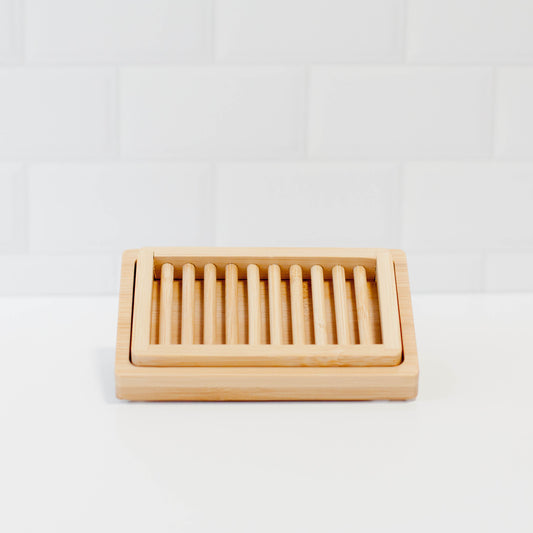 Dual-Layer bamboo soap dish on counter with tile backsplash