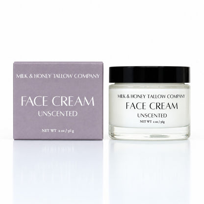 Box and glass jar of Unscented Face Cream on a white background